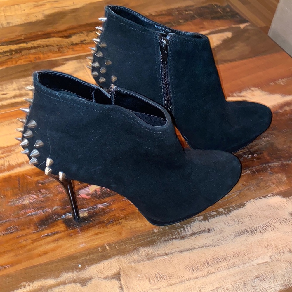 Spiked black heel booties
